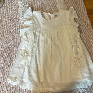 White shirt with ruffle sleeves